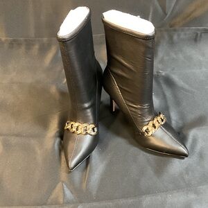 XOXO Black Heeled Boots with Gold Chain